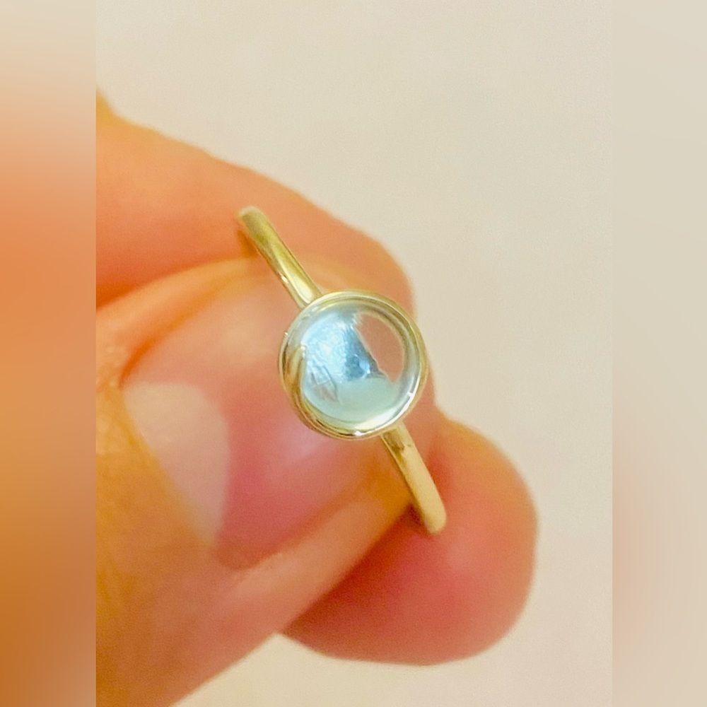 14 K Gold Ring  with Moonstone. Brand new. Size 8.5